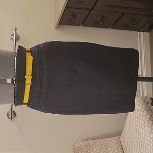 Ricki's dark indigo denim pencilskirt with yellow belt. Size 8